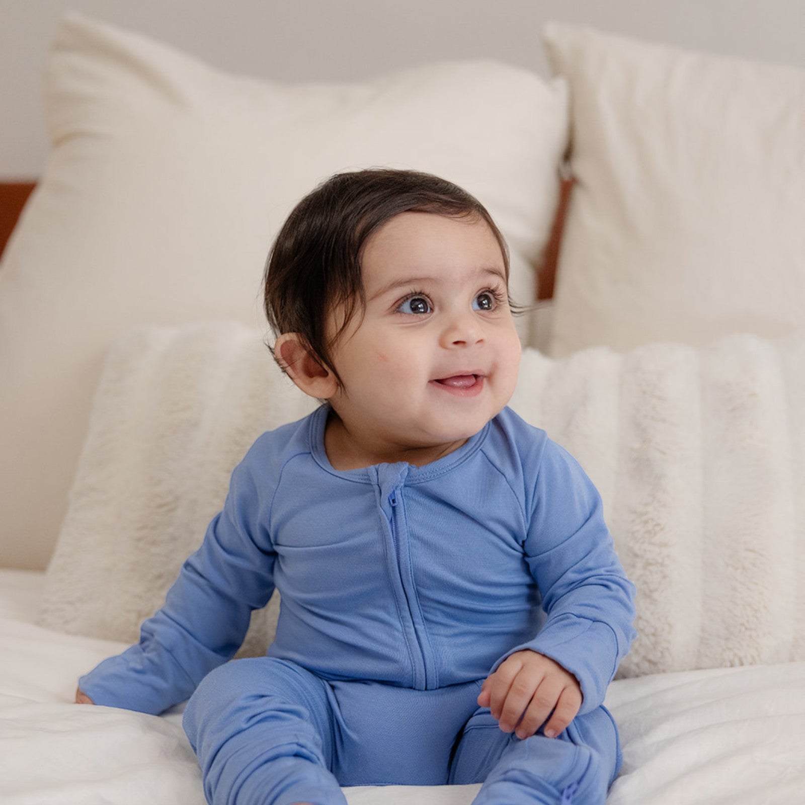 Baby wearing bamboo zip romper/sleeper in sky blue color