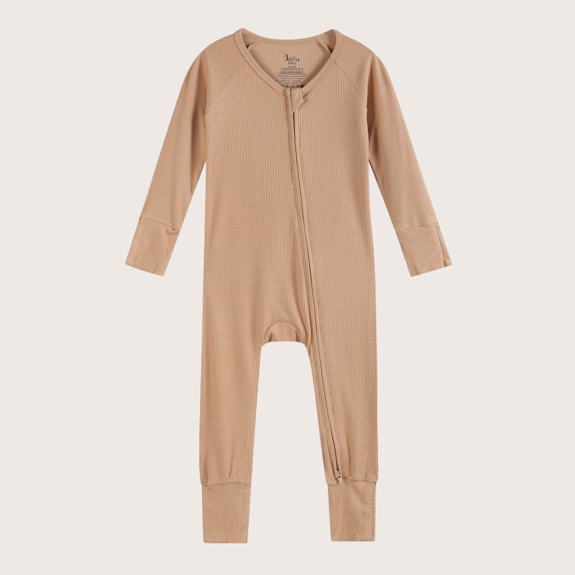 Ribbed bamboo zipper romper in sand beige color featuring practical features for convenience like fold over mittens and footies
