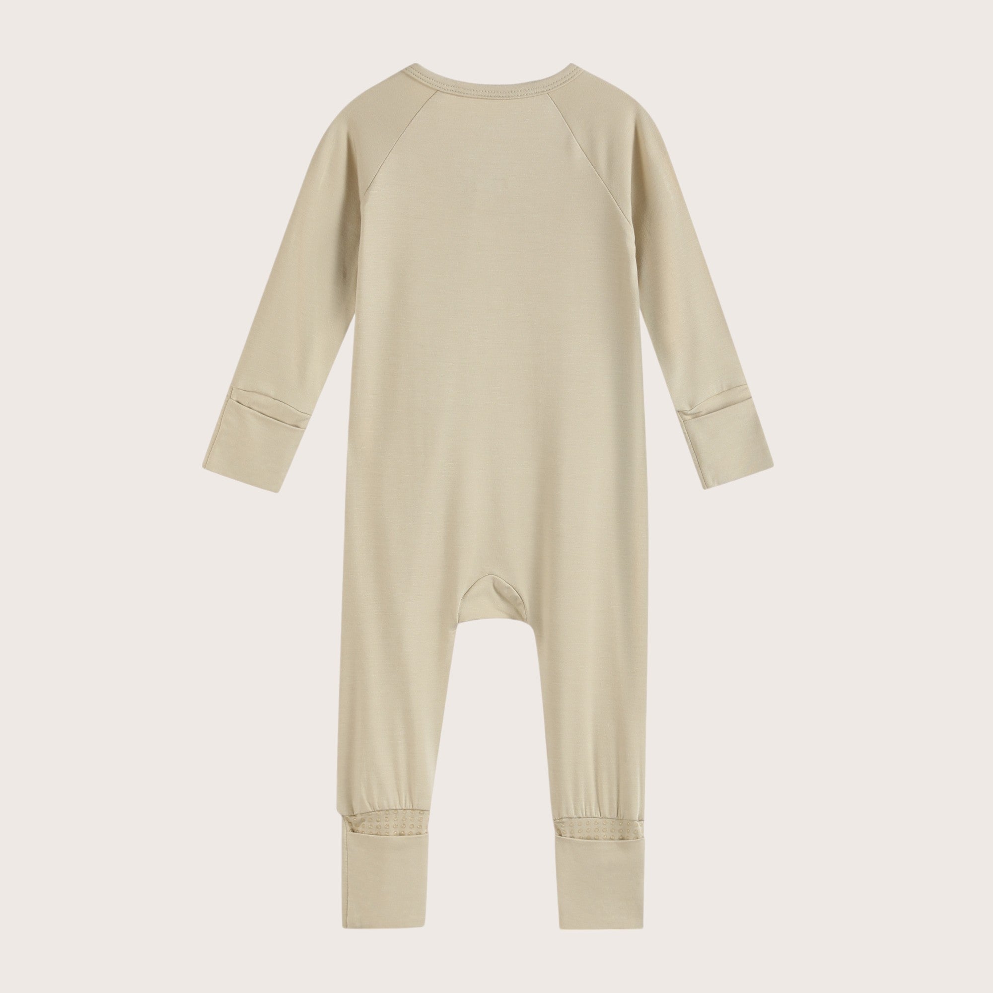 Bamboo Zip Romper and Sleeper in apricot beige color featuring practical features like fold over mittens, footies and two-way zipper