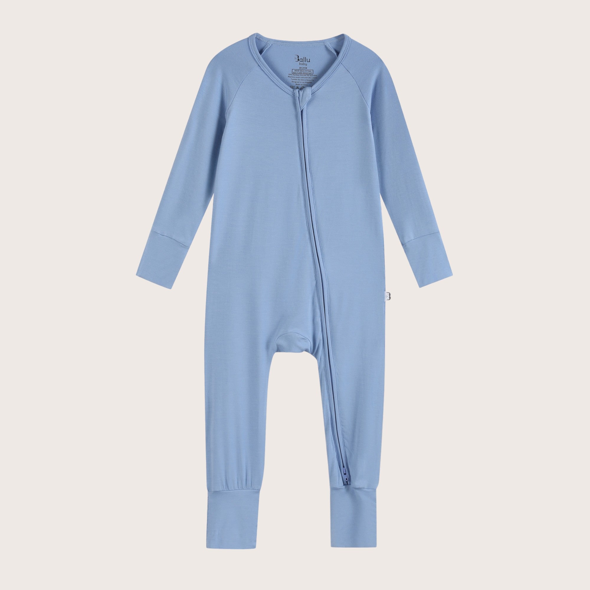 Bamboo Zip Romper and Sleeper in sky blue color featuring practical features like fold over mittens, footies and two-way zipper