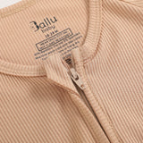Ribbed bamboo zipper romper in sand beige color featuring two-way zipper and fold over footies with grips