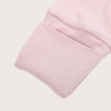 Ribbed bamboo zipper romper in blush pink color featuring fold over mittens