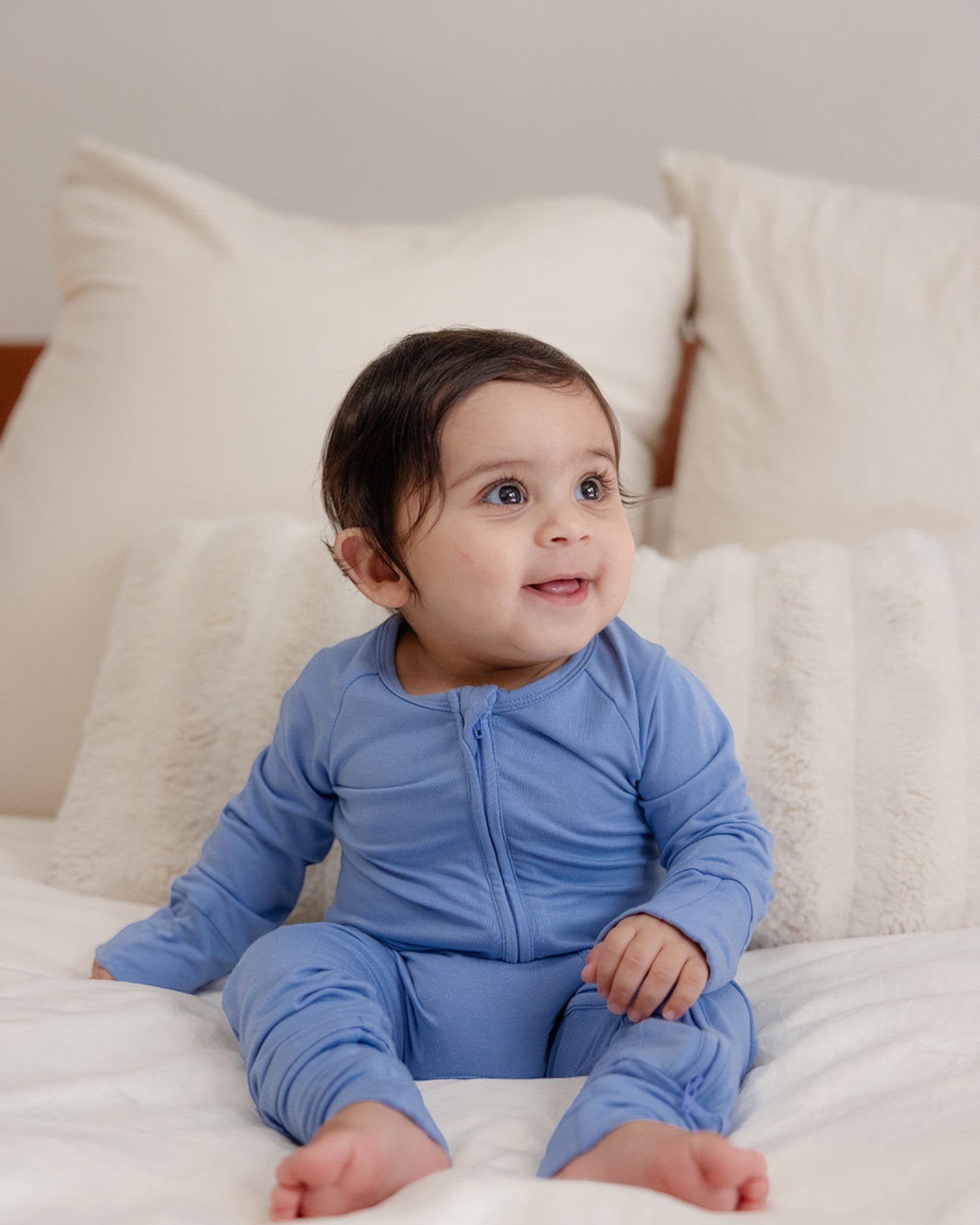 Baby wearing bamboo zip romper/sleeper in sky blue color