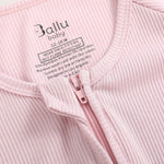 Ribbed bamboo zipper romper in blush pink color featuring two-way zipper